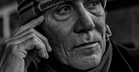 Old man thinking in black and white